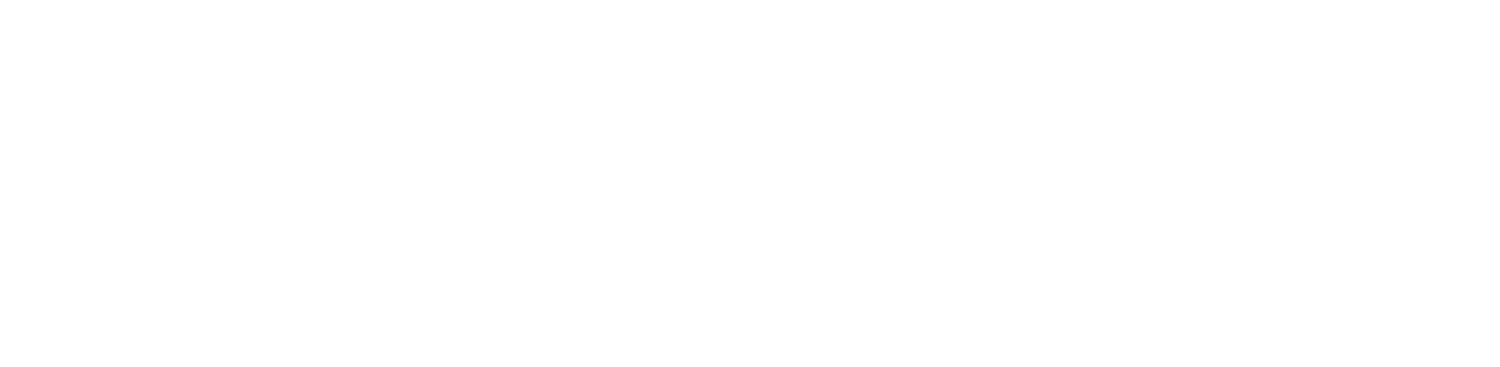 View of a scenic landscape with trees and water, framed by architectural elements.